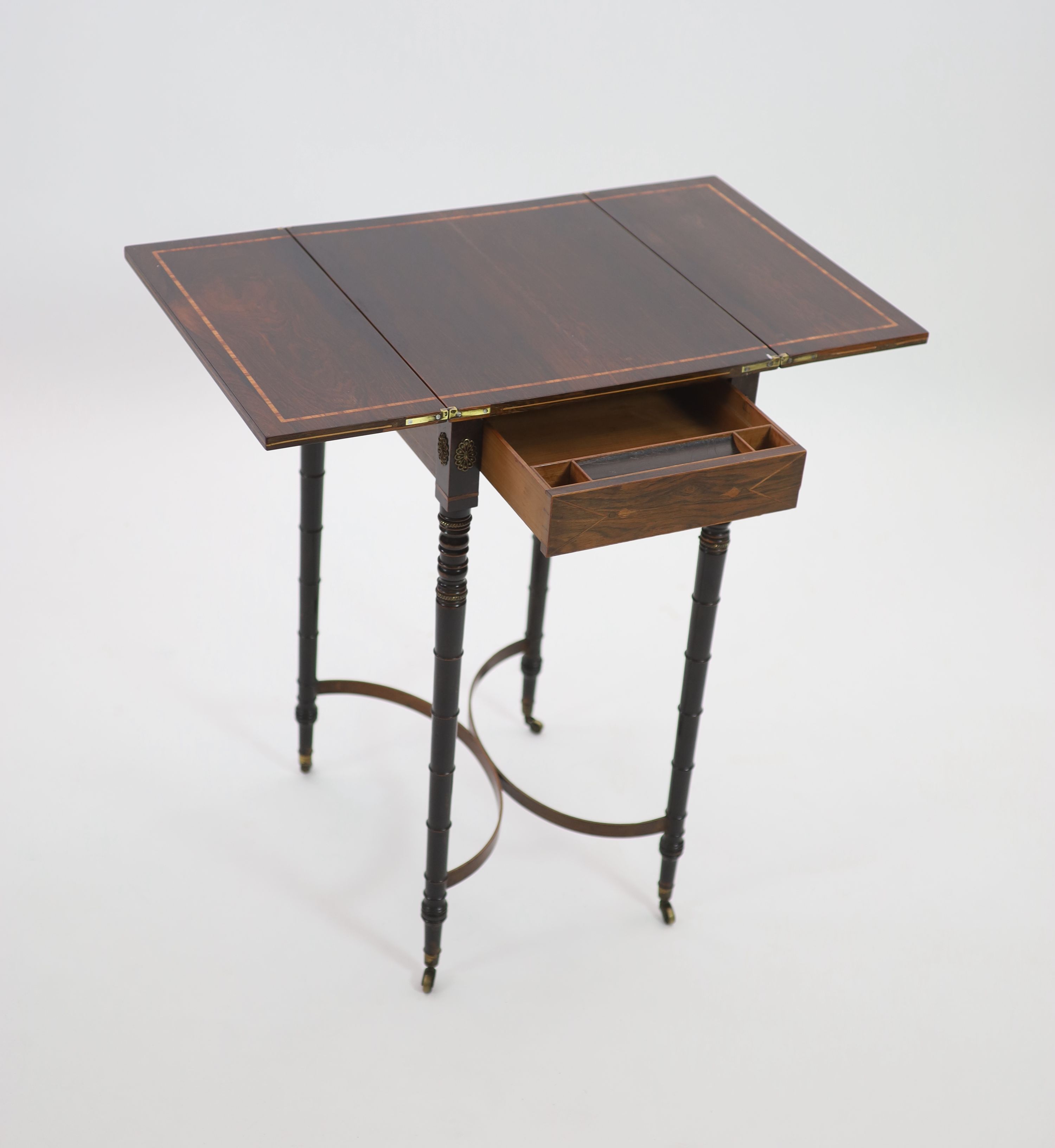 A Regency inlaid rosewood and ebony writing table, W.46cm D.37cm H.78cm